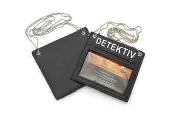 Leather case for hanging around the neck with DETEKTIV inscribed on one side